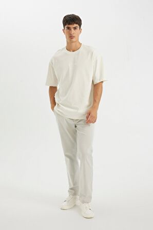 DeFacto Oversize Fit Bisiklet Yaka Sırt Baskılı Kısa Kollu Tişört D4911AX24AUER98