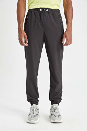 DeFactoFit Sporcu Jogger Eşofman Altı Standart Fit Çift Cepli Dokuma Beli Paçası Lastikli B5147AX24SPAR231