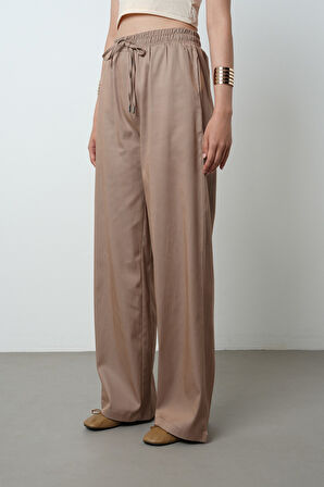 Kadın Bol Paça Beli Lastikli Düz Renk Pantolon