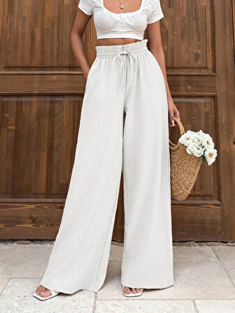 Keten bağcıklı beyaz pantolon