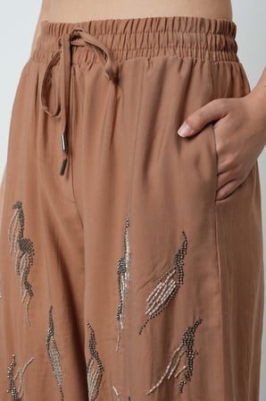 Kadın Önü Taş İşlemeli Düz Renk Beli Lastikli Bol Paça Pantolon
