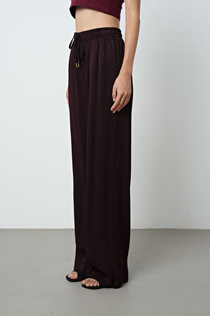 Kadın Düz Renk Altın Rengi Bağcık Detaylı Bol Paça Beli Lastikli Pantolon