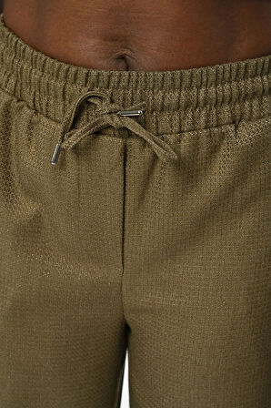 KADIN BELİ LASTİKLİ BOL PAÇA SİMLİ DÜZ RENK PANTOLON