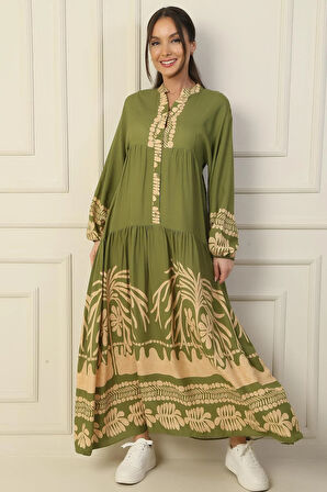 Önü Yarım Düğmeli Kolu Lastikli Empirme Tesettür Uzun Elbise