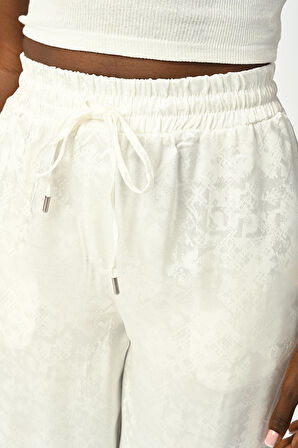 KADIN EKRU RENK DESENLİ BOL PAÇA BELİ LASTİKLİ PANTOLON