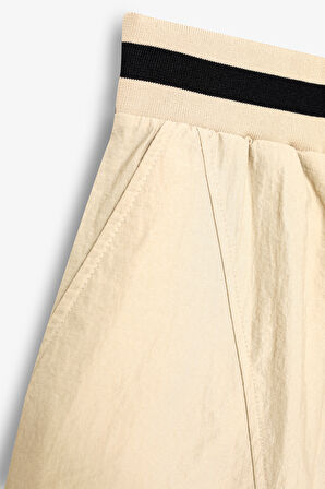 Beli Ribanalı Paraşüt Pantolon Bej