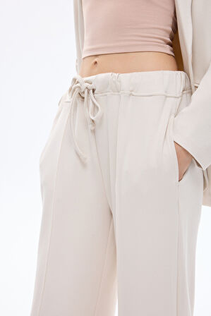 Dikiş Detaylı Yumuşak Dokulu Bol Paça Pantolon Bej