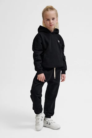 Hummel Pamuklu Loose Fit Logolu Elastik Paça Eşofman Altı Unisex Çocuk EŞOFMAN ALTI 232951-2001 SİYAH