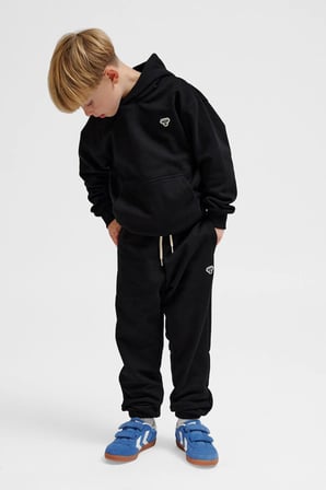 Hummel Pamuklu Loose Fit Logolu Elastik Paça Eşofman Altı Unisex Çocuk EŞOFMAN ALTI 232951-2001 SİYAH