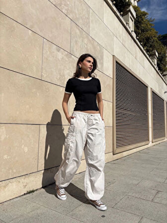 BİÇOMİ Yaka kol garnili ön parçalı bluz