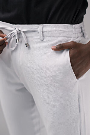 Beli Lastikli ve İplikli Armürlü Slimfit Pamuklu Likralı Jogger Pantolon