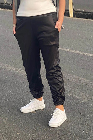 Kadın Siyah Deri Görünümlü Paçası Lastikli Pantolon