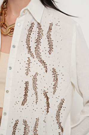 KADIN ÖNÜ BONCUKLU OVERSİZE KESİM DÜZ RENK GÖMLEK