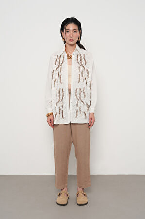 KADIN ÖNÜ BONCUKLU OVERSİZE KESİM DÜZ RENK GÖMLEK