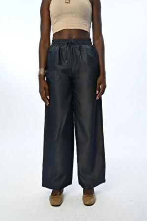 KADIN BELİ LASTİKLİ BOL PAÇA PARLAK KUMAŞ DÜZ RENK PANTOLON