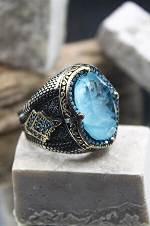 Mavi Paraiba Taşlı Ve Firuze Süslemeli Yanları Işlemeli Oval 925 Ayar Gümüş Erkek Yüzük