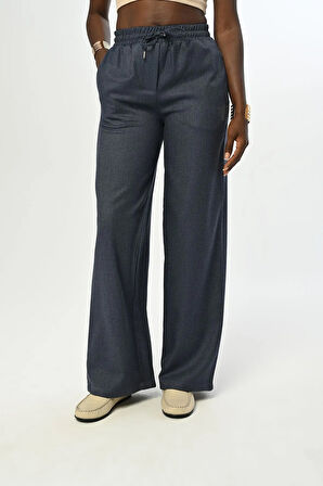 KADIN BELİ LASTİKLİ BOL PAÇA SİMLİ DÜZ RENK PANTOLON