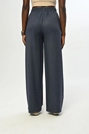 KADIN BELİ LASTİKLİ BOL PAÇA SİMLİ DÜZ RENK PANTOLON