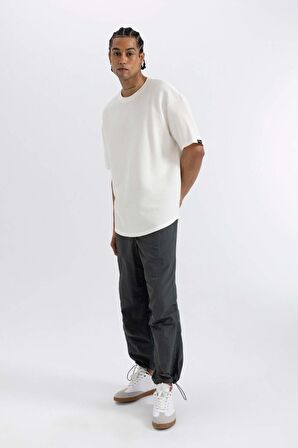 DeFacto Yazlık Pantolon Relax Fit Rahat Kesim Kargo Cepli Lastikli Paça B5832AX24SPGN498