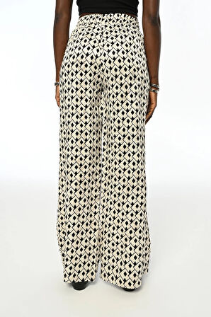 KADIN DESENLİ BELİ LASTİKLİ BOL PAÇA PANTOLON