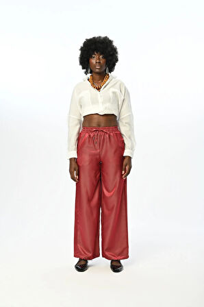 KADIN BELİ LASTİKLİ BOL PAÇA PARLAK KUMAŞ DÜZ RENK PANTOLON