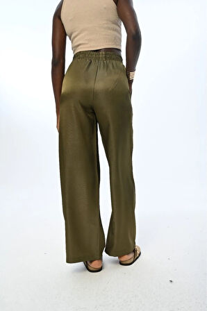 KADIN BELİ LASTİKLİ BOL PAÇA PARLAK KUMAŞ DÜZ RENK PANTOLON