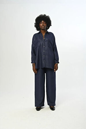 KADIN DÜZ RENK SİMLİ ÇİFT CEPLİ KOLLARI BÜZGÜLÜ OVERSİZE KESİM GÖMLEK