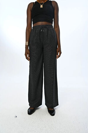 KADIN BELİ LASTİKLİ BOL PAÇA SİMLİ DÜZ RENK PANTOLON