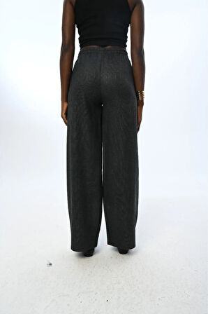 KADIN BELİ LASTİKLİ BOL PAÇA SİMLİ DÜZ RENK PANTOLON