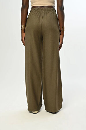 KADIN BELİ LASTİKLİ BOL PAÇA SİMLİ DÜZ RENK PANTOLON