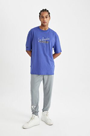 DeFactoFit NBA Los Angeles Lakers Oversize Geniş Kalıp Bisiklet Yaka Sırt Baskılı Pamuklu Kısa Kollu Tişört C9256AX24AUPR76