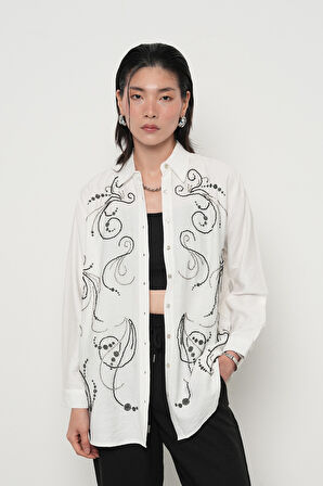 KADIN ÖNÜ BONCUK İŞLEMELİ OVERSİZE KESİM DÜZ RENK GÖMLEK