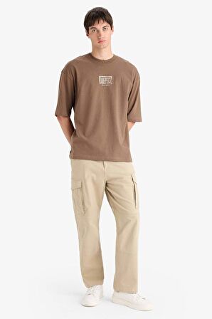 DeFacto %100 Pamuk One Piece Loose Fit Bisiklet Yaka Sırt Baskılı Kısa Kollu Tişört E0713AX25SMBN322