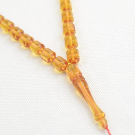 Fıçı Kesim 10 x7 mm  Ateş Kehribar Sistem Püsküllü Tesbih