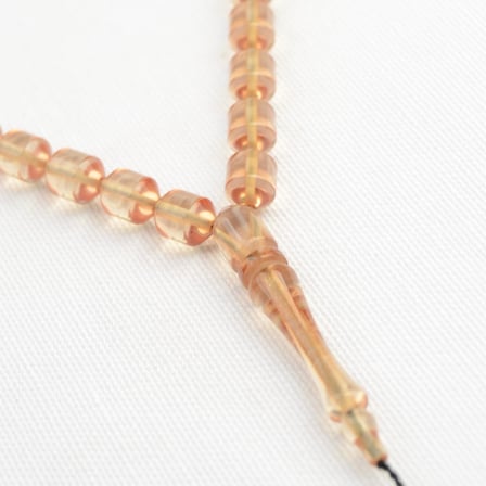 Fıçı Kesim 10x7 mm İmzalı Seri Şeffaf Ateş Kehribar Sistem Püsküllü Tesbih