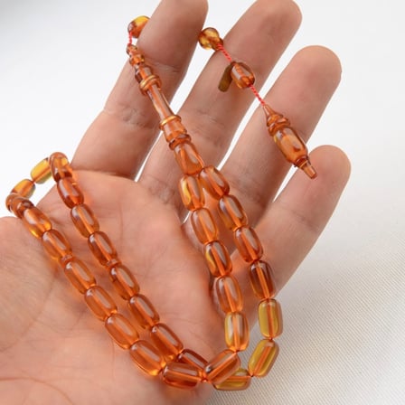 Kapsül Kesim 11X7 mm  İmzalı Seri Ateş Kehribar Sistem Püsküllü Tesbih