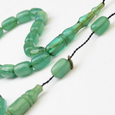 Kapsül Kesim 11X7 mm İmzalı Seri Hareli Sıkma Kehribar Sistem Püsküllü Tesbih