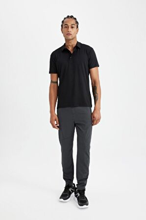 DeFactoFit Sporcu Dokuma Pantolon Slim Fit Dar Kesim Çift Cepli Fermuarlı Paça C9262AX24AUAR231