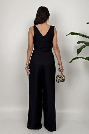 Élan Kadın Siyah Drapeli Detaylı Tulum – Dokulu Kumaş Şıklığı