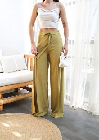 Keten Önü Çapraz Parçali asti̇kli̇ Ve Bağcikli Geni̇ş Paça Pantolon