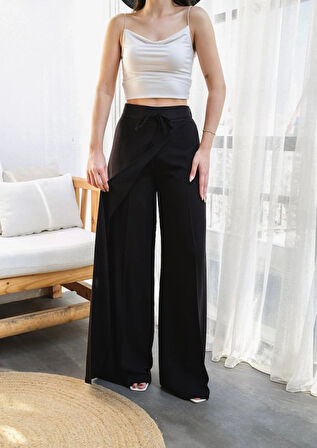 Keten Önü Çapraz Parçali Lasti̇kli̇ Ve Bağcikli Geni̇ş Paça Pantolon