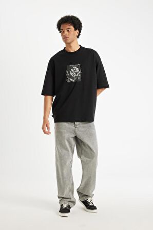 DeFacto Siyah Loose Fit Bisiklet Yaka Çiçek Baskılı Ağır Kumaş Kısa Kollu Tişört C7056AX24AUBK81