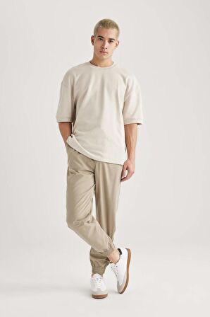 DeFacto Jogger Gabardin Pantolon Regular Beli Bağcıklı Cepli Lastikli Paça B7493AX24SPBG783