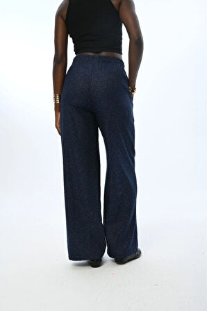 KADIN BELİ LASTİKLİ BOL PAÇA İNCE SİMLİ DÜZ RENK PANTOLON