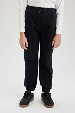 DeFacto Erkek Çocuk Beli Bağcıklı Cepli Lastikli Paça Jogger Basic Düz Pantolon B6713A824SMBK81