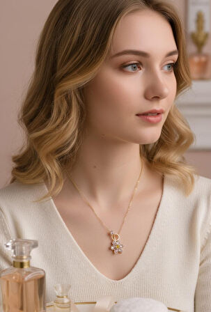 Altın Renk Taşlı Çiçek Figürlü Çelik Kolye