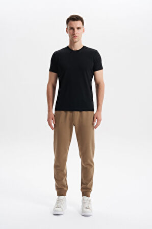 Arma Erkek Slim Fit Örme Interlok Basic Dar Paça Eşofman Altı Arka ve Yan Fleto Fermuar Cepli Paçalar Ribanalı %80 Pamuk %14 Polyester %6 Elastane K30174998902 