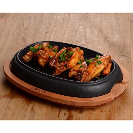 Lava Döküm Oval Hot Plate, ahşap altlıklı. Ölçü 26x19cm.