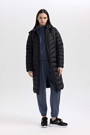 DeFactoFit Su İtici Uzun Şişme Mont Parka Kapüşonlu Slim Fit Dar Kesim Kapitoneli Fermuarlı Cepli A1556AX23WNBK81