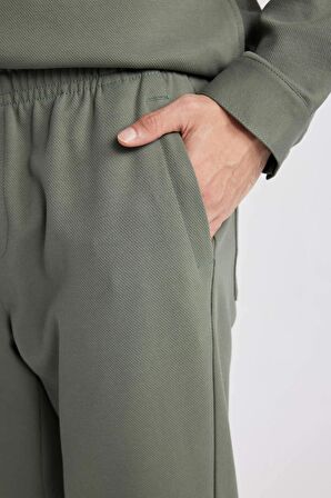 DeFacto Yazlık Jogger Pantolon Relax Fit Rahat Kesim Düz Paça Cepli Beli Bağcıklı B4521AX24SPKH398